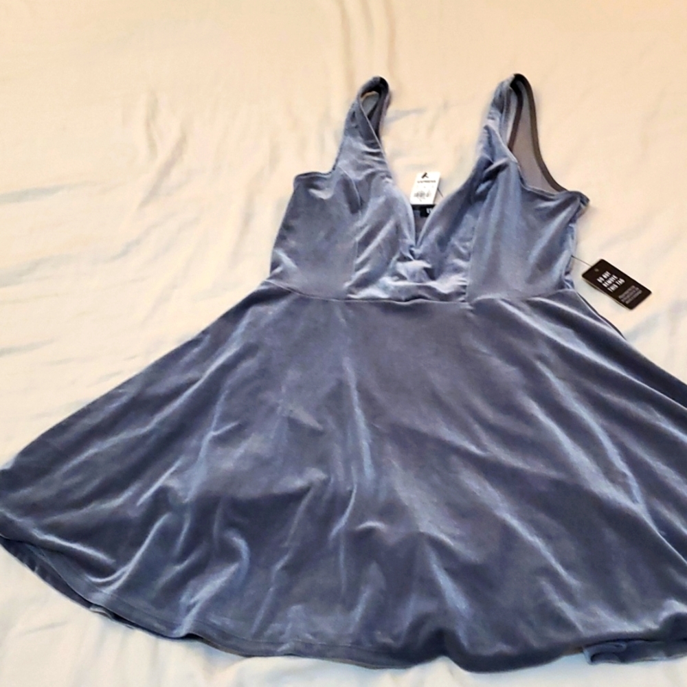 Fited top, flare Skater dress Velvet like feel built in shorts!